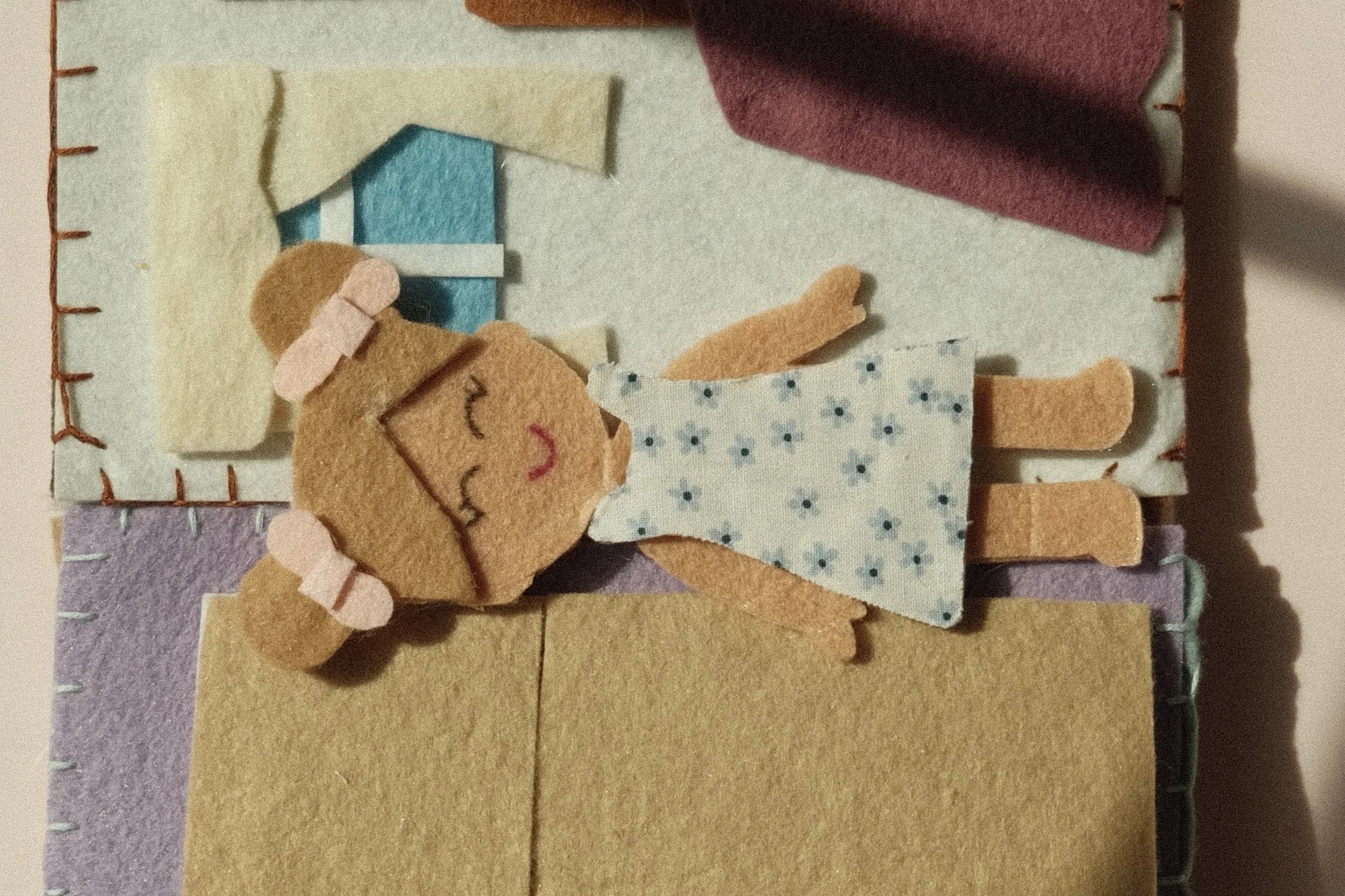 Bailey Langston at her craft table, making handmade keepsakes